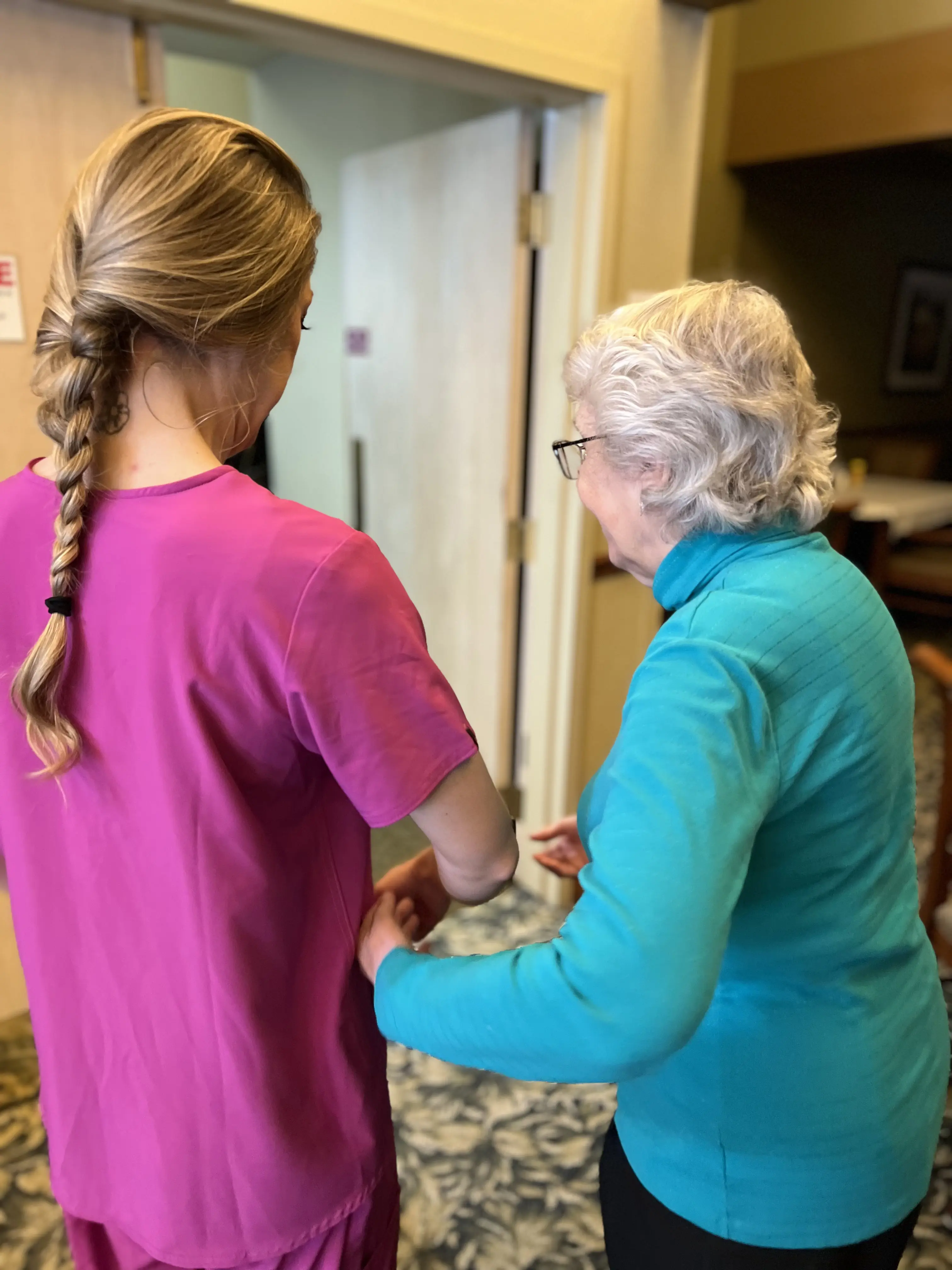 memory care working walking resident