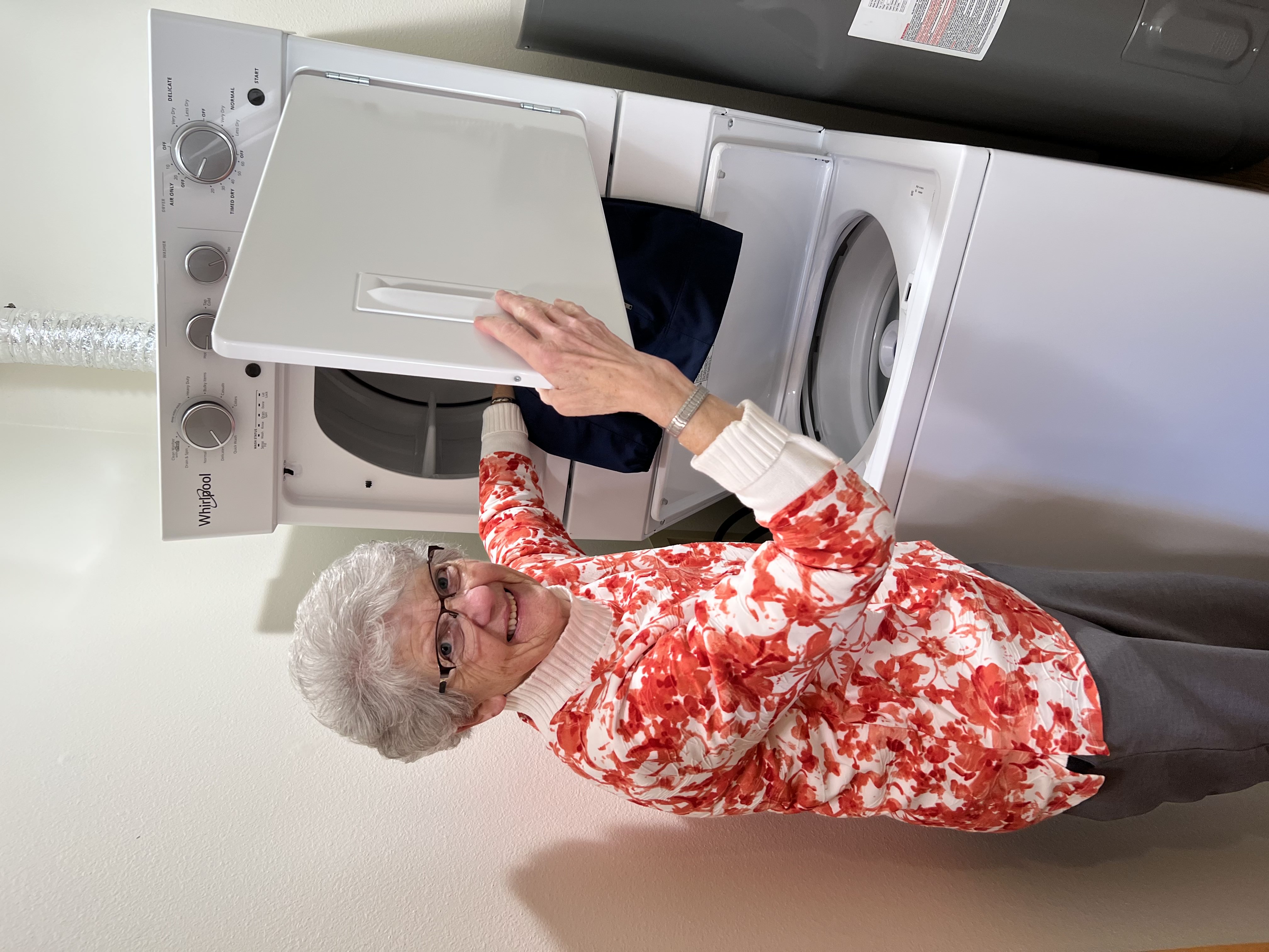 woman grabbing laundry
